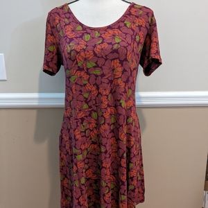 RVCA mini dress. Medium. Muted pastel colors. Medium. Floral print